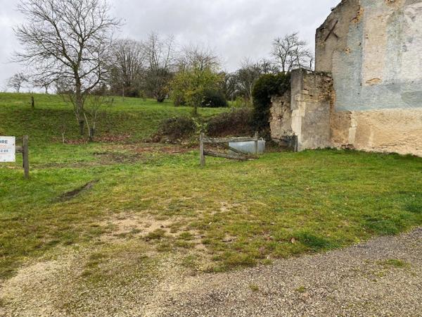 terrain à batir de 300 M2 ,avec un verger de 1965 M2