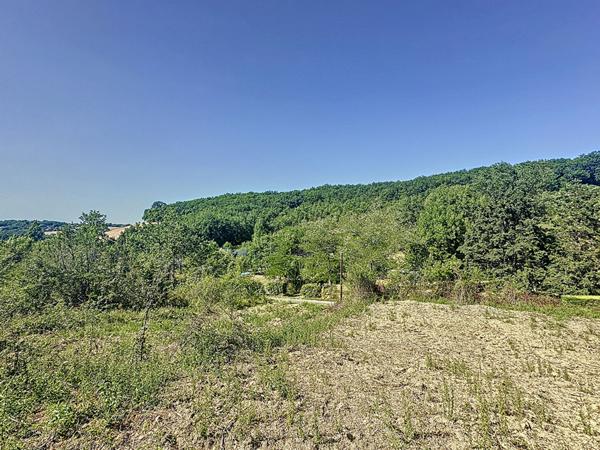 A vendre Terrain constructible Duran 6070 m2 avec bois et hors lotissement