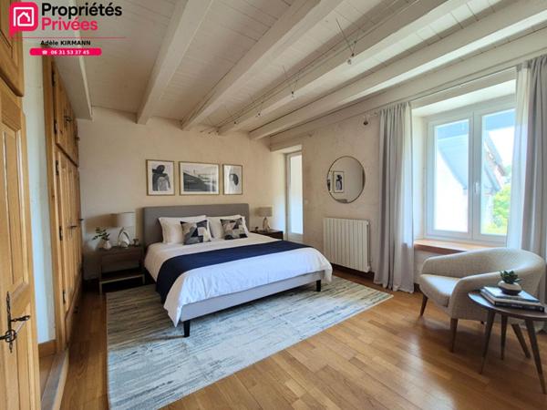À vendre Collonges 01550 - Maison en pierre rénovée 4 chambres avec jardin et garage