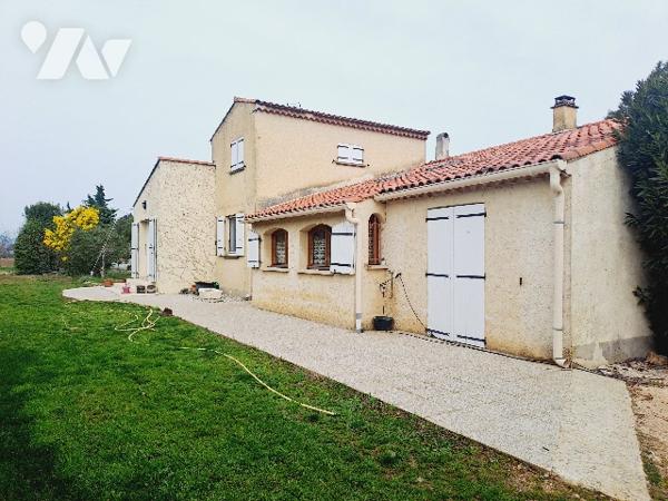 SAUZET, maison de 150m² habitable avec piscine et vaste jardin arboré.