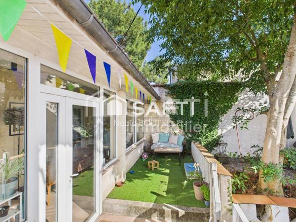 Bel appartement 4 piéces, jardin, véranda.