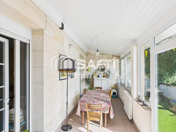 Bel appartement 4 piéces, jardin, véranda.