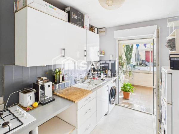 Bel appartement 4 piéces, jardin, véranda.