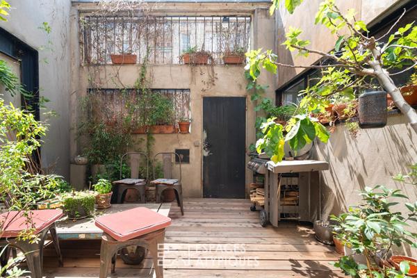Loft avec jardin d’hiver et patio