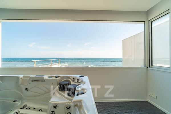 Villa d'exception en première ligne sur la plage