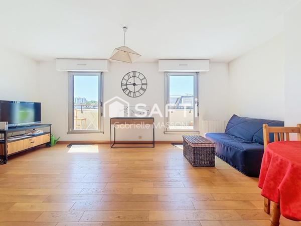 Bel appartement dernier étage avec TERRASSE CAVE et PARKING