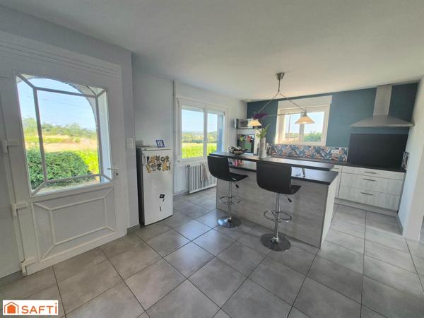 Maison avec hangar et terrain constructible