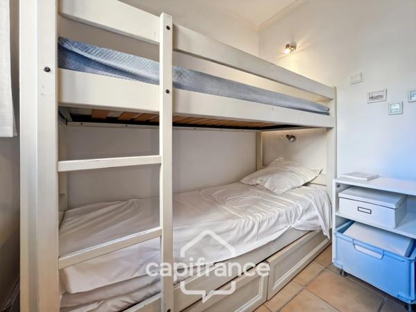 appartement REZ de JARDIN,résidence du lac, 31 m2, chambre ouverte, grande salle de douche, rangements, cave collective.