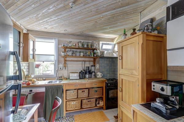 Appartement 3 pièces traversant avec balcon et un garage.