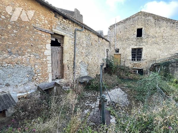 Lot de 2 habitations à rénover en centre-ville