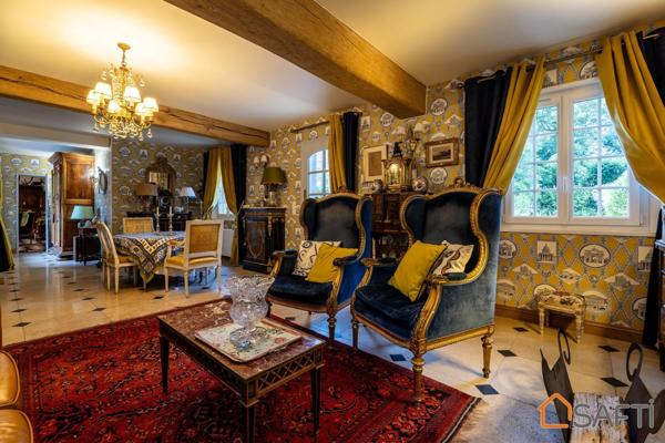 Manoir de 11 pièces, 8 chambres, 5 salles d'eau et 1 salle de bain avec un beau jardin paysager de 2800m2