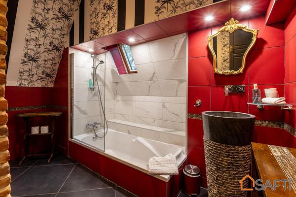 Manoir de 11 pièces, 8 chambres, 5 salles d'eau et 1 salle de bain avec un beau jardin paysager de 2800m2