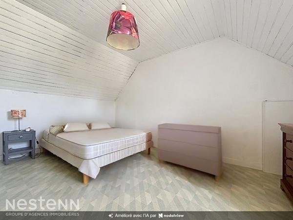 Maison en pierre de 77m², 3 chambres proche commodités à pied.