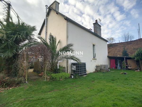 Maison en pierre de 77m², 3 chambres proche commodités à pied.