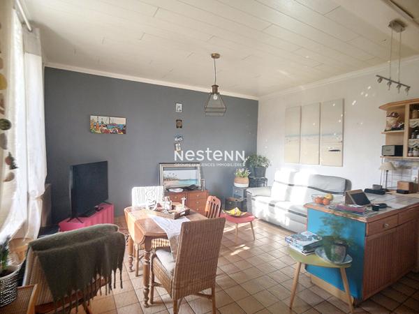 Maison en pierre de 77m², 3 chambres proche commodités à pied.