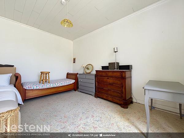 Maison en pierre de 77m², 3 chambres proche commodités à pied.