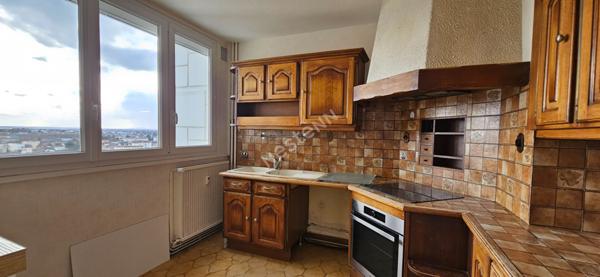 Appartement T4 avec balcon, parking, cave et gardien? Quartier Boucicaut à Chalon sur Saône