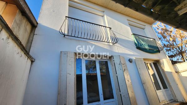 Immeuble 2 appartements et 2 garages 167 m2