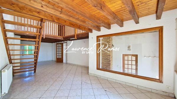 Maison en pierre de caractère avec beau potentiel