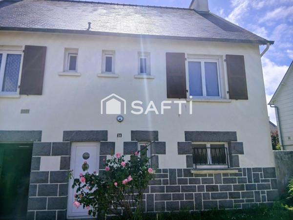 Maison familiale 4 chambres avec grands garages et beau terrain clos