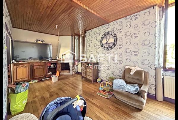 Maison avec beau potentiel