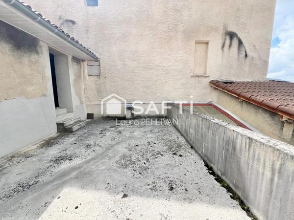 idéal investisseur ! Appartement + local co avec terrasse surplombant le centre ville de St-Amour