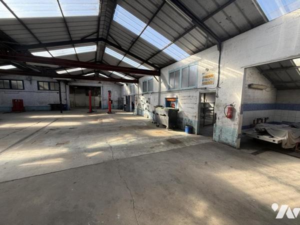 Ancien atelier de carrosserie à fort potentiel