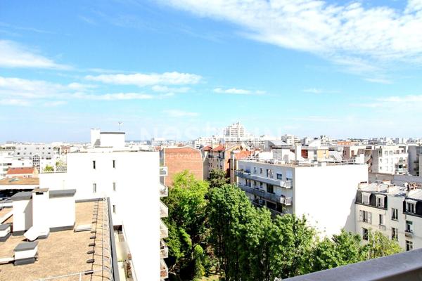 Appartement Courbevoie 4 pièces traversant vue Paris et la Défense balcons lumineux DPE D