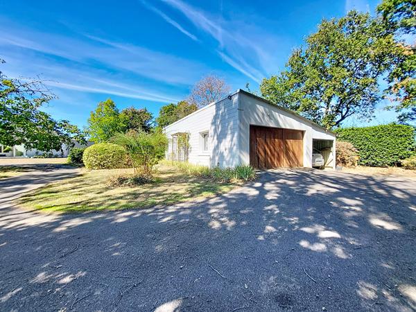 Maison traditionnelle à Carquefou - Un havre de paix sur un terrain arboré