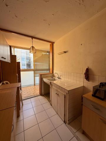 6? étage avec ascenseur, Balcon, Cave, Potentiel