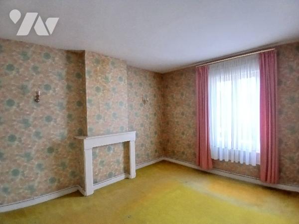 Maison de ville 2ch, jardin, beau séjour et combles aménageables