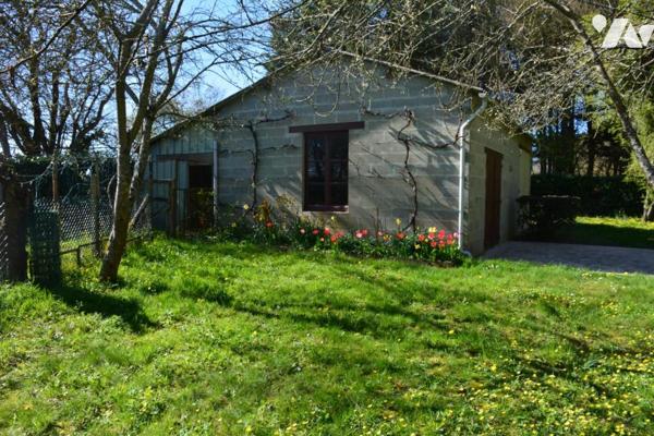 vente sur la commune de Bouère un terrain loisirs avec un étang et un hangar