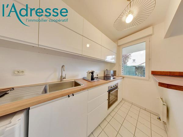 Appartement Emerainville 2 pièce(s) 36 m2 avec jardinet + Box