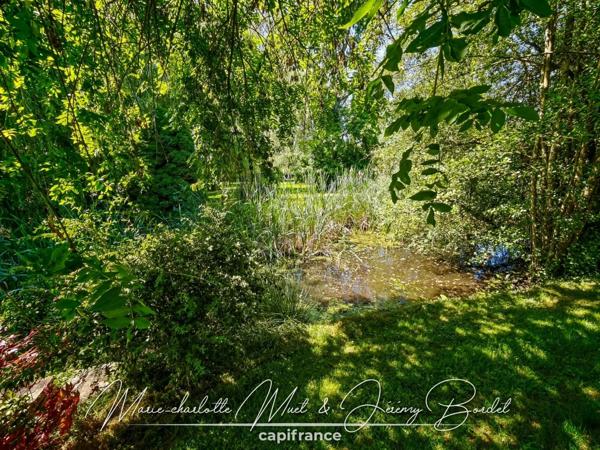 Longère de caractère avec parc arboré