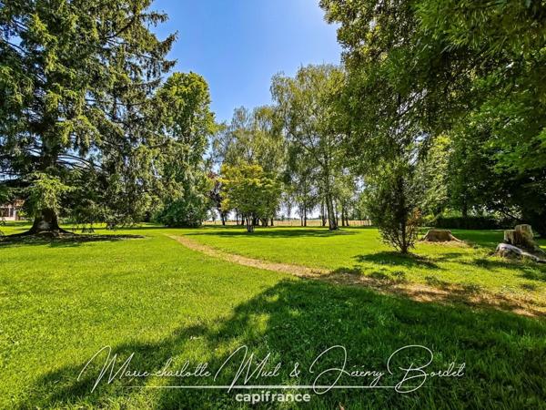 Longère de caractère avec parc arboré