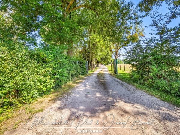Longère de caractère avec parc arboré