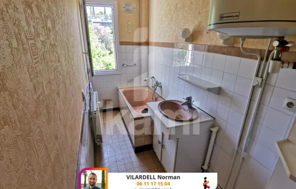 Appartement T4 avec Double Séjour et Balcon