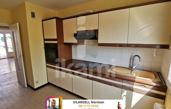 Appartement T4 avec Double Séjour et Balcon