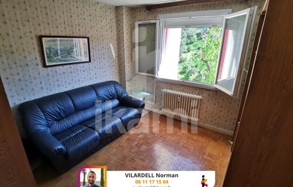 Appartement T4 avec Double Séjour et Balcon