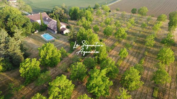 Propriété de 297m² avec terrain arboré de 2 hectares et 5214m ²