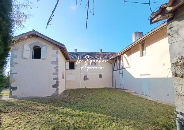 Propriété de 297m² avec terrain arboré de 2 hectares et 5214m ²