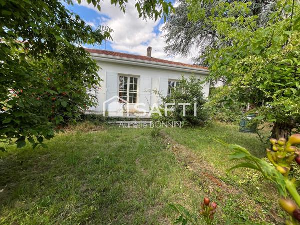 Maison de plain pied proche des commerces avec garage