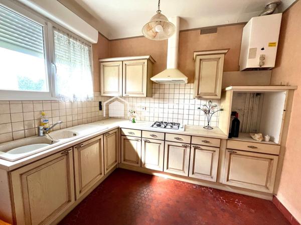 Maison de plain pied proche des commerces avec garage