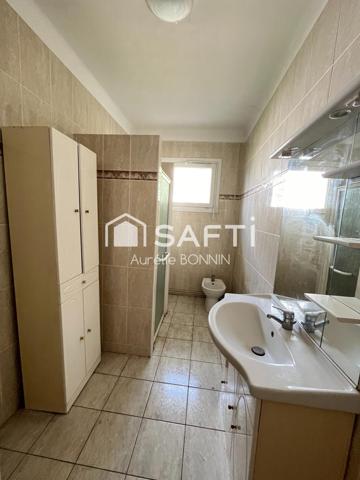 Maison de plain pied proche des commerces avec garage