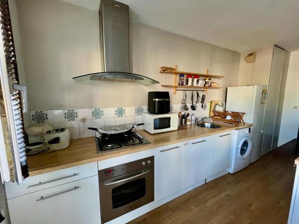 Appartement T2 spacieux avec terrasse et place de parking couvert