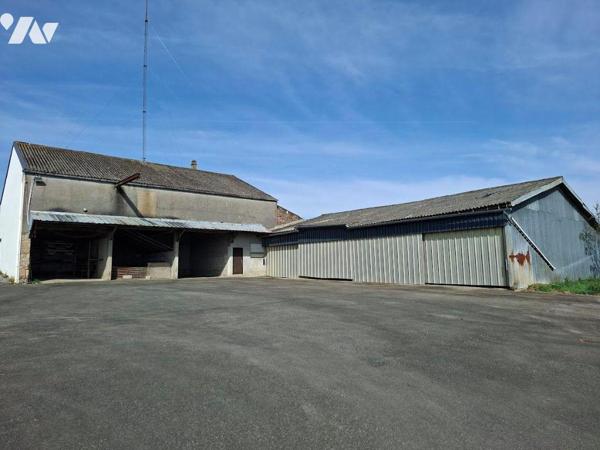 RARE - ENSEMBLE immobilier (maison, bureaux, hangars) composé d'une habitation de 300 m² compre...