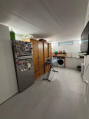 Maison individuelle style mansart de 1974 restaurée en 2025.