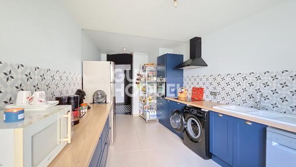 Appartement à vendre de 5 pièces de 104.7 m² avec jardin et garage