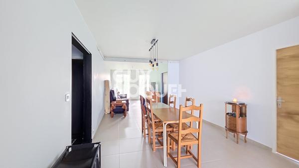 Appartement à vendre de 5 pièces de 104.7 m² avec jardin et garage