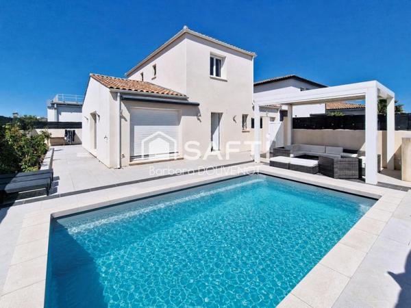 Villa récente de 120 m² sur 335 m² de terrain - 3 chambres, garage, terrasses et piscine.